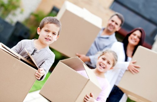 Professional removal service handling packed belongings for a local move