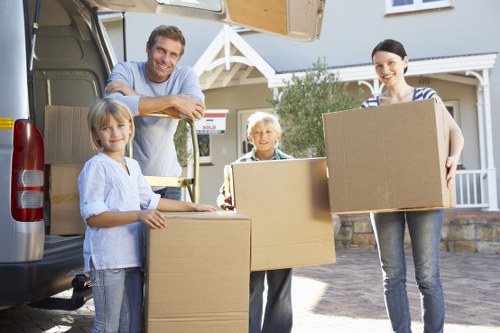 Packed boxes and wrapped furniture prepared for transport