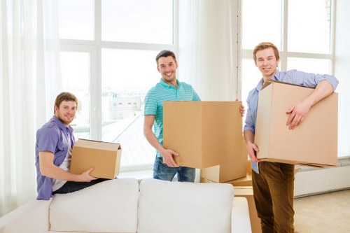 Office equipment and furniture being transported during a local commercial move